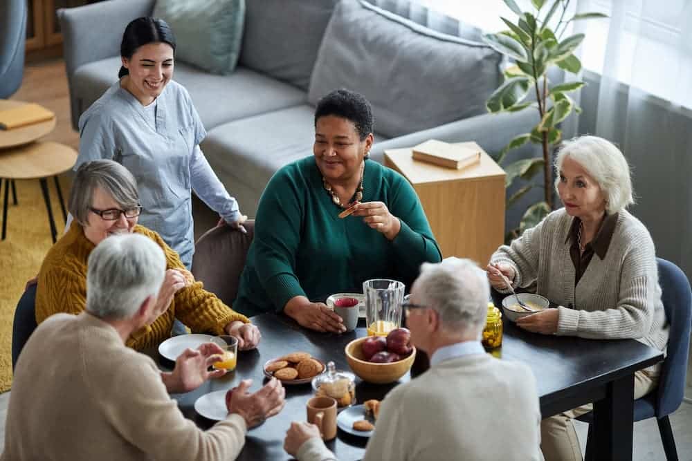 senior residents engaging in activities in assisted living