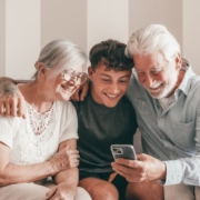 grandparents connecting with their grandchild through technology